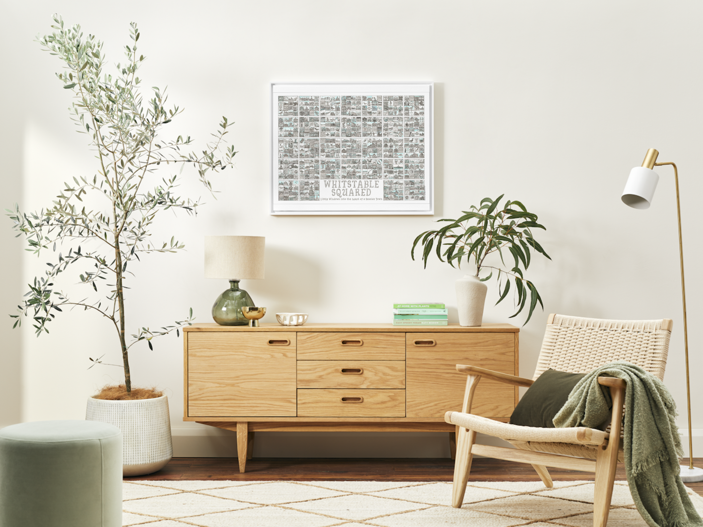 One Whitstable Squared landscapes A2 picture in a white frame in a living room with plants