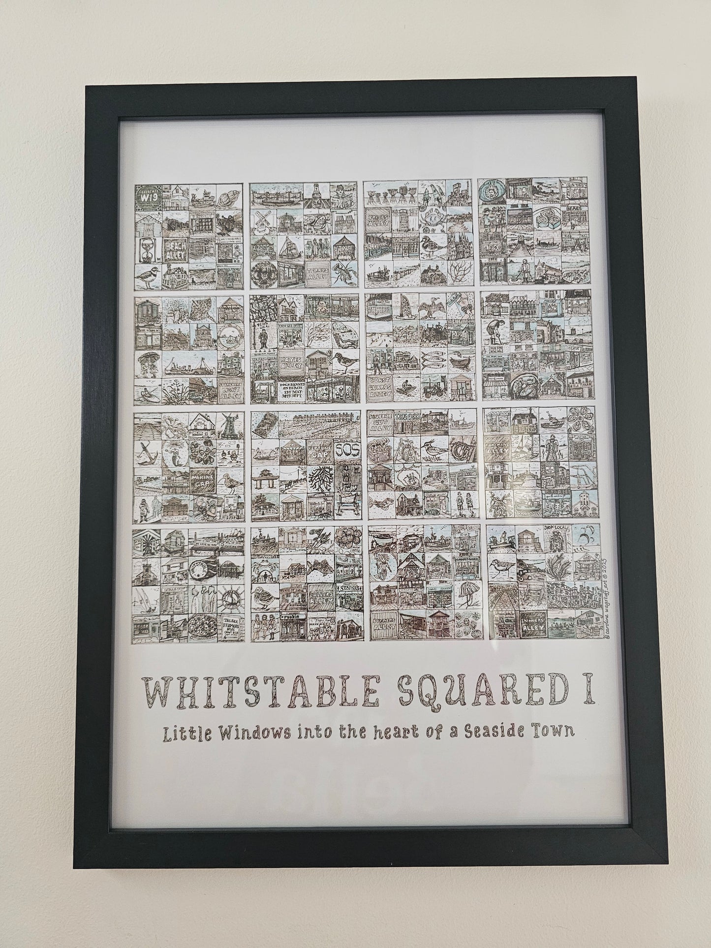 A3 Whitstable Squared print in a black frame on a white wall